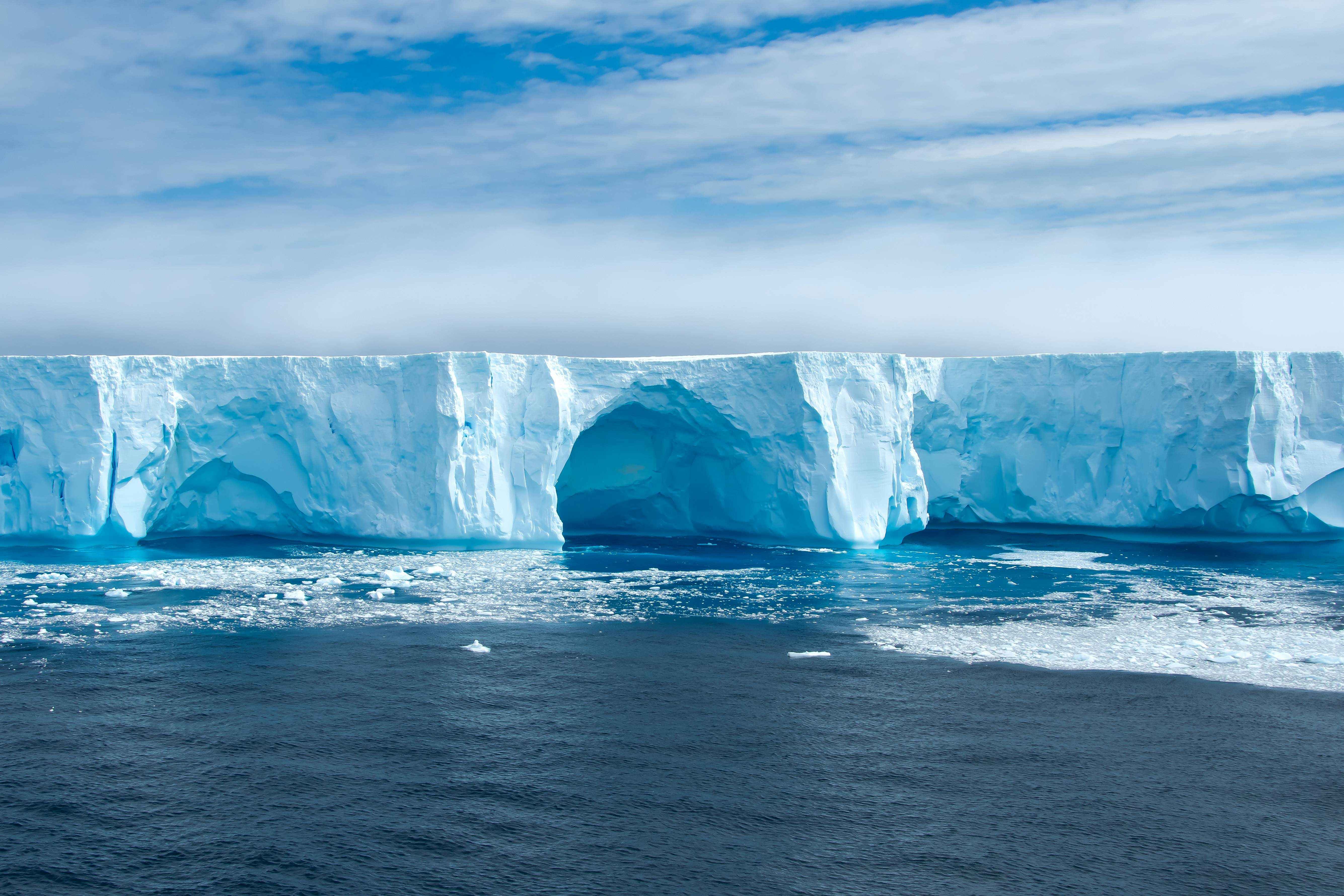 Beautiful blue iceberg and ice floe in Admiralty bay, King George Island Antarctica.